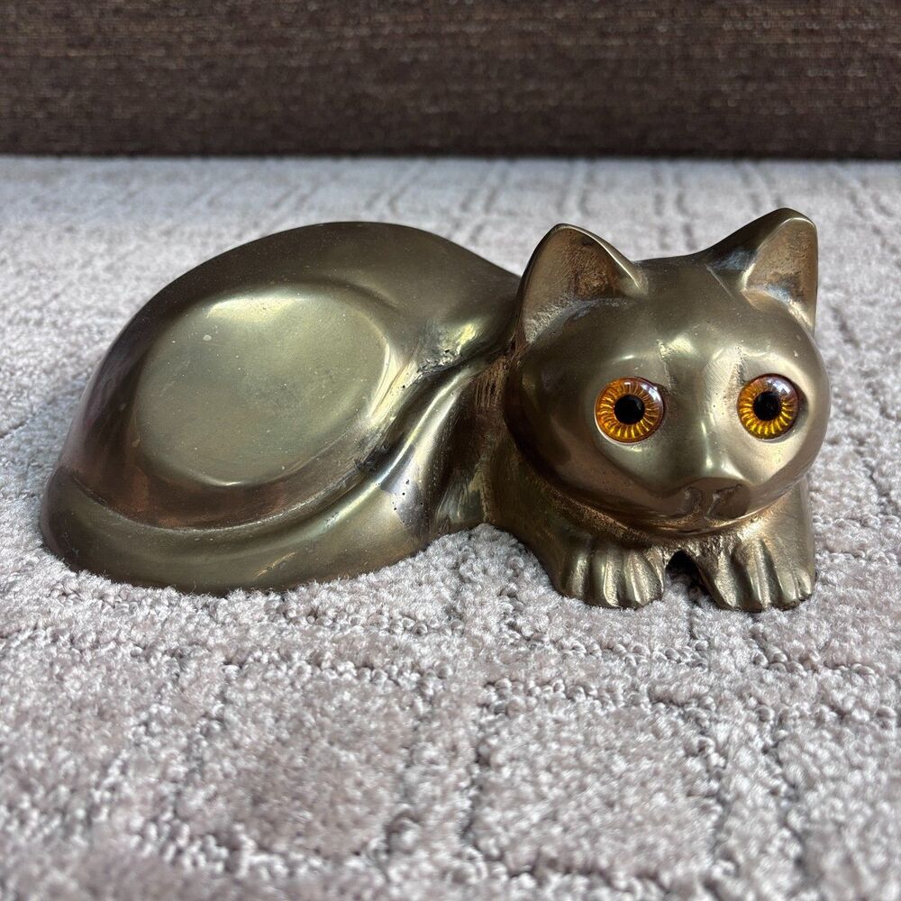 Vintage Brass Reclining Cat Statue Amber Eyes Hollow Bottom MCM Decor